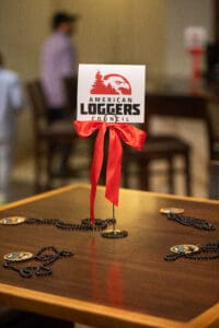 American Loggers Council sign on table.