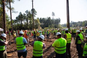 Construction workers gathered for outdoor safety briefing