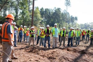 Outdoor safety briefing with construction crew