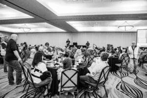 People gathered at a conference event hall.