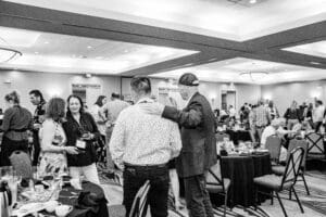 People mingling at a conference event.