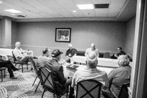 Group meeting in a conference room.