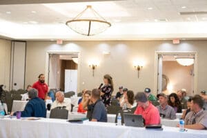 Conference attendees in a discussion session.