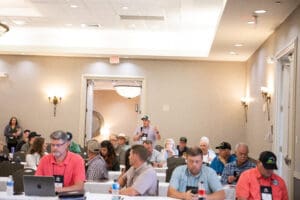 Conference attendees in hotel meeting room