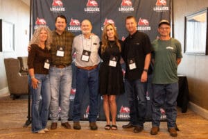 Group of people at a loggers conference.