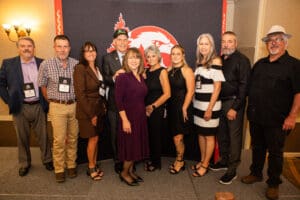 Group photo of people at a conference.