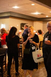 People networking at indoor conference reception