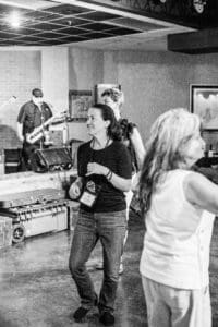 People dancing at a live music event.