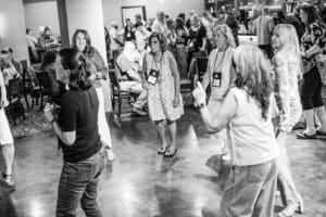 People dancing at a lively social event.