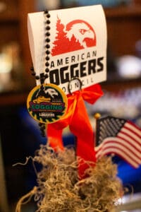 American Loggers Council sign with decorations.