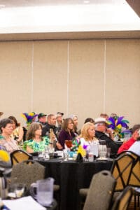 People seated at a banquet event.